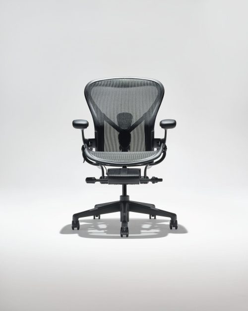 Herman Miller Aeron Chair - Graphite. The king of Ergonomic Chairs. Mesh Seat and Mesh Bask, the Aeron remains an innovative design chair.