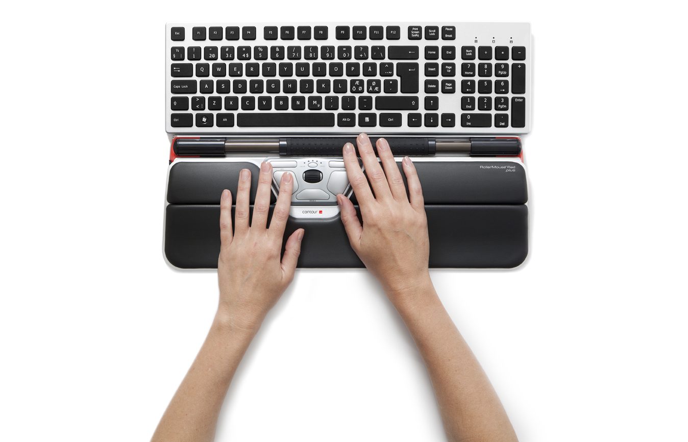 Overhead view of hands using the Contour RollerMouse Red Plus