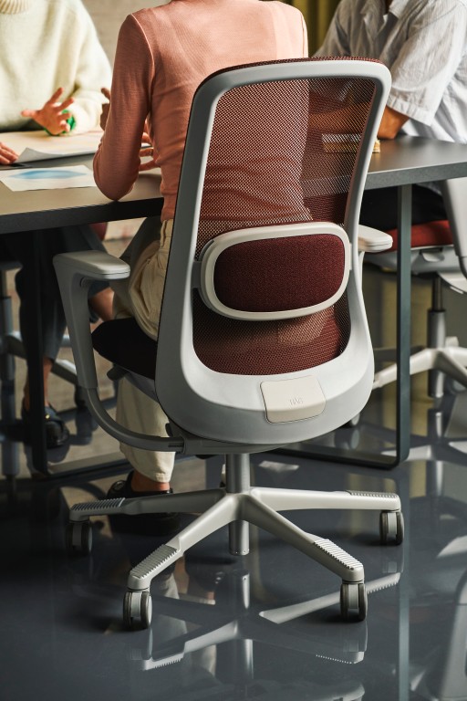 Close-up of the mesh back and SlideBack armrest on the HÅG SoFi Mesh