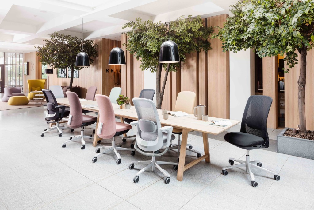A row of HÅG SoFi Mesh chairs around a meeting table