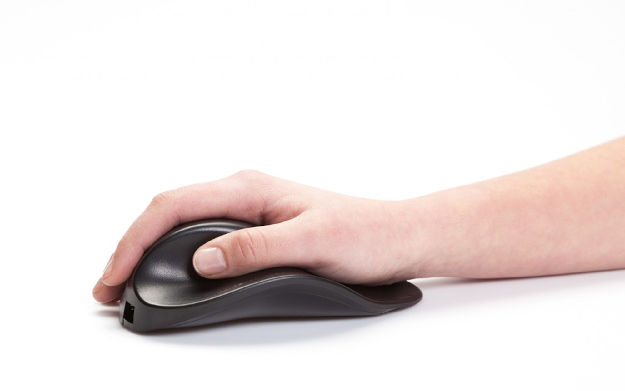Side profile of the HandshoeMouse Original showing its sculpted 25 degree angle
